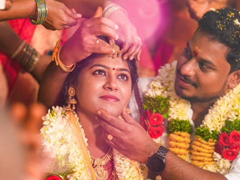Candid wedding photographer in Banashankari, Bangalore capturing South Indian wedding rituals